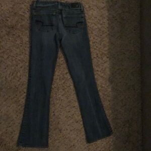 American eagle 360% stretch blue jeans. Size 0, used good condition.